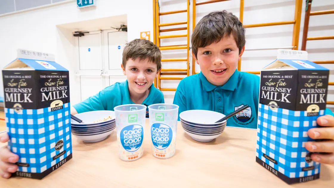 Max Robilliard and Barnaby Mauger enjoying a glass of milk this morning.
