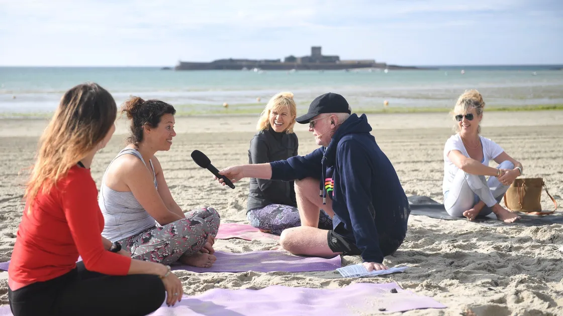 Chris Evans broadcast his Virgin Radio breakfast show live from Jersey yesterday, including a segment on yoga on the beach. (Picture by David Ferguson, 29843915)