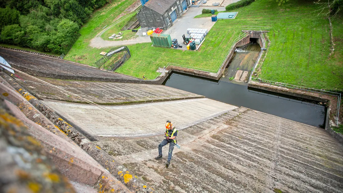 Picture by Sophie Rabey.  04-09-24.   Geomarine have started work on clearing the dam wall of St Saviours Reservoir, removing the weeds and debris that has built up over the last few years..Lewis Battle.. (33568810)