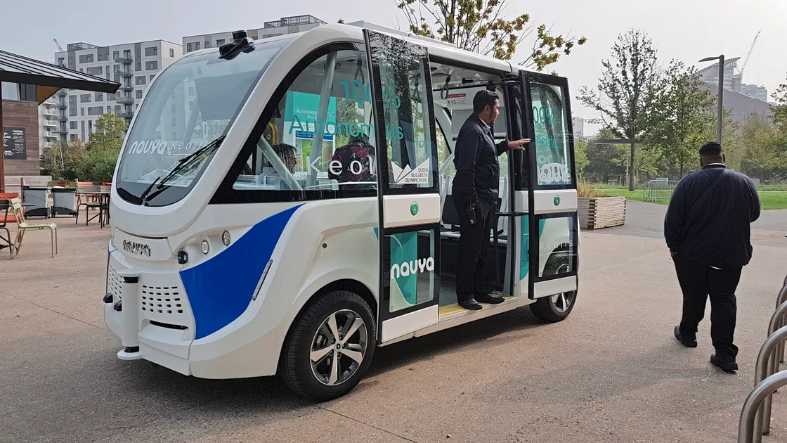 A Navya autonomous bus running at Olympic Park in London. The vehicle is narrower than the buses brought in this summer, but could not run on island roads because they would not be suitable for heavy traffic.