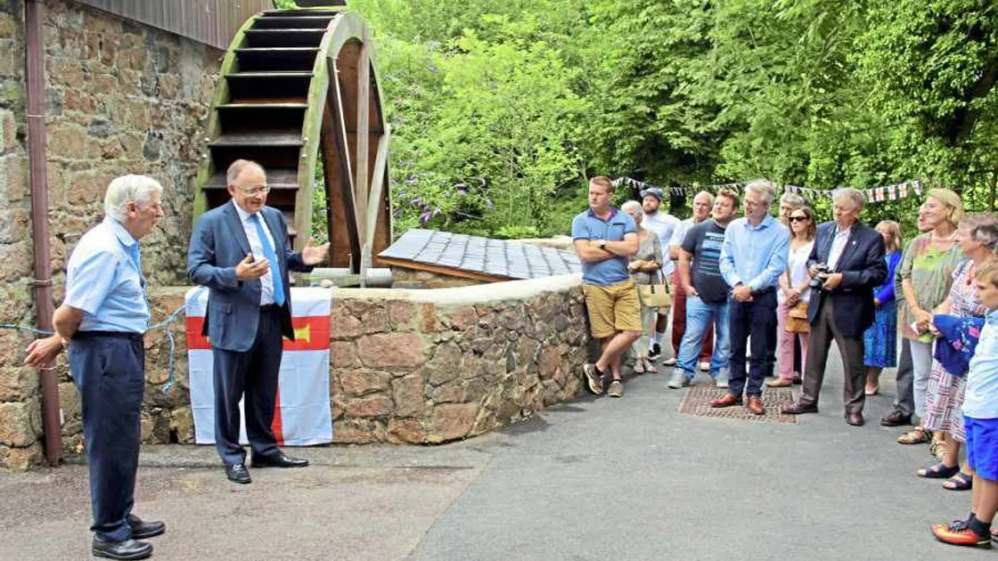 Restored water wheel is turning again after decade