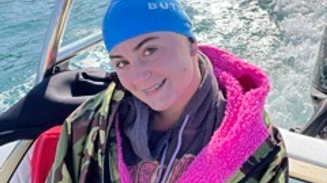 Delphine Riley set records as the youngest and fastest person to swim from Guernsey to Alderney while not wearing a wetsuit.
