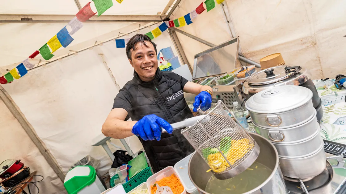 Himalayan Kitchen head chef Bikash Tamang serving up a Himalayan Sherpa Noodle Soup
