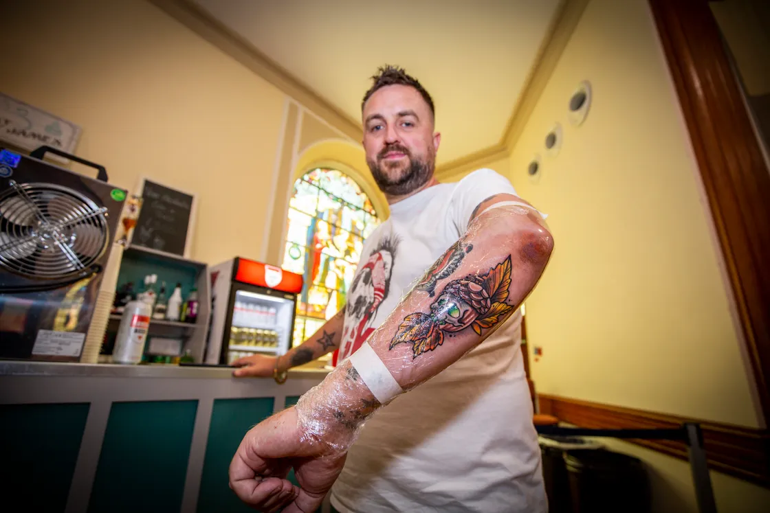 Joe Hind with his new tattoo from Luke Gallie. (31018903)