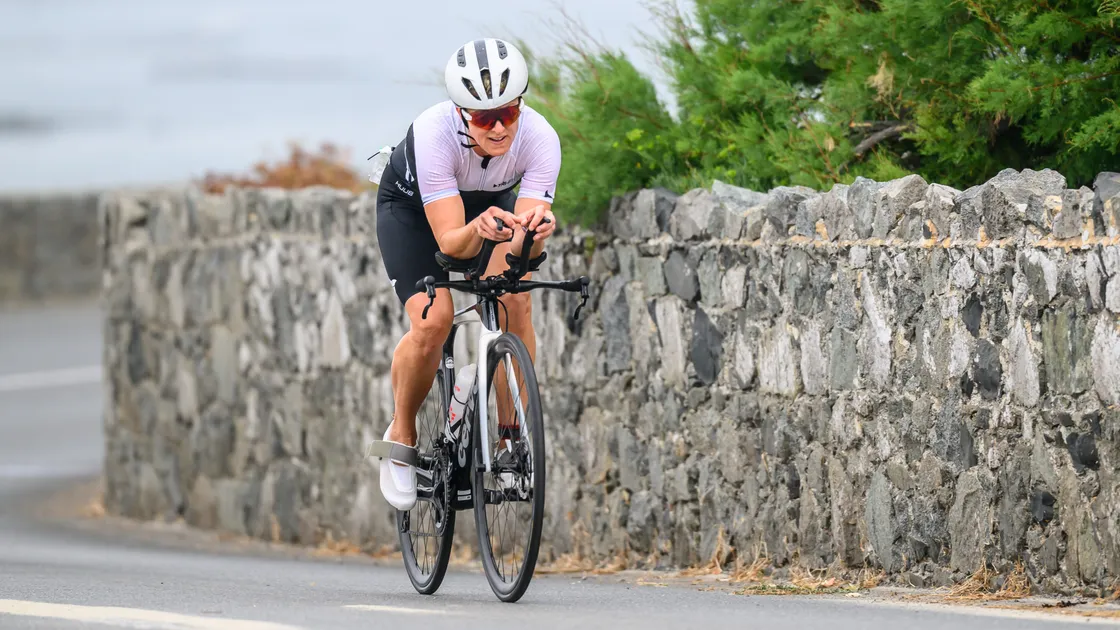 Amy Critchlow en route to winning Sunday's Rocquaine Sprint Triathlon and earning an automatic Island Games place.