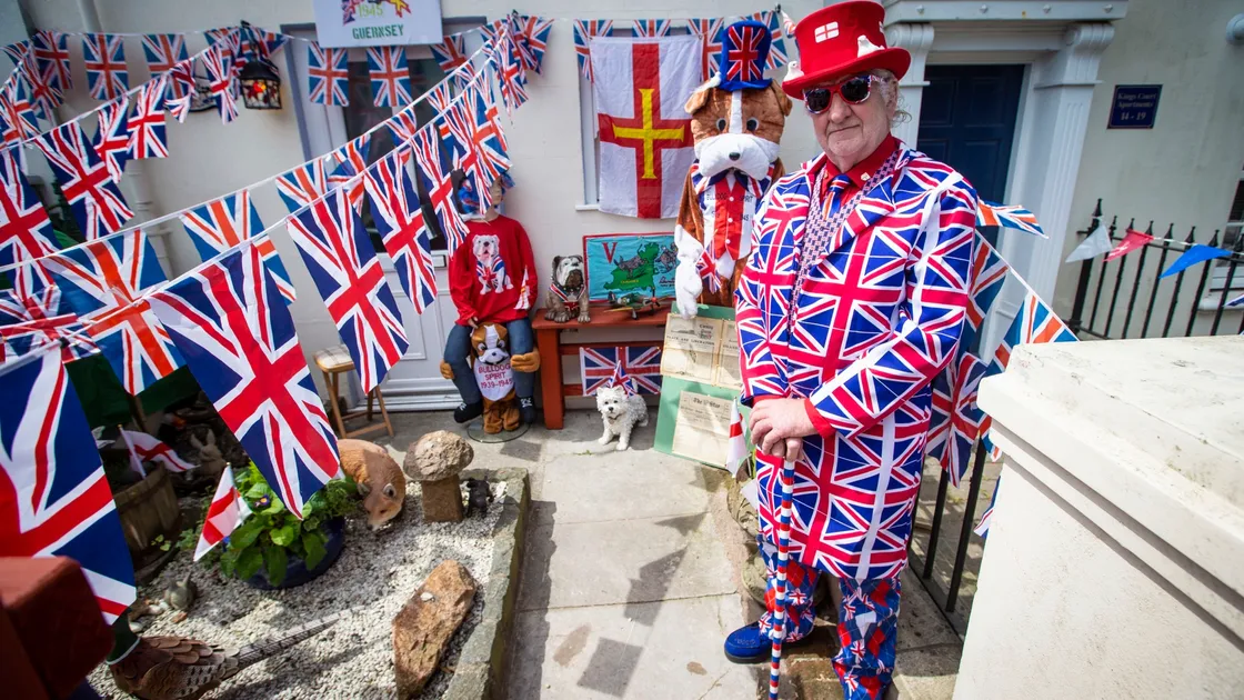 Decorate to Liberate was the request from the States when the normal celebrations were cancelled due to the coronavirus. Geoff Le Gallez took the government at its word with bunting and memorabilia all over his front garden, including Guernsey Press pages from 1945. Then he added his suit and cane and hat to complete the picture. (Picture by Sophie Rabey, 28248999)