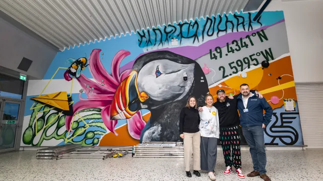 Local artists put finishing touches to new airport mural