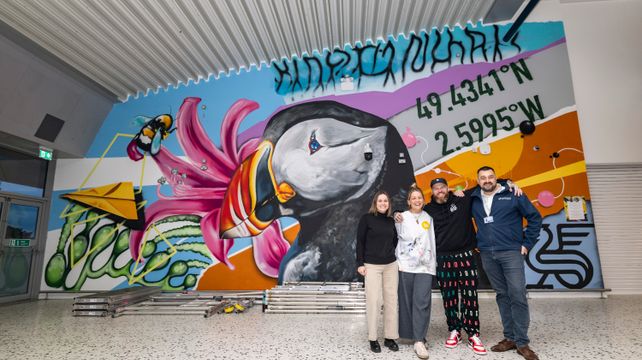 Local artists put finishing touches to new airport mural