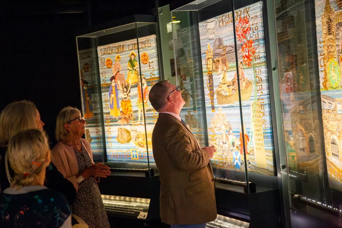 The tapestry showcases 1,000 years of Guernsey’s history across its 10 panels and was made by 200 local enthusiasts in the run-up to the year 2000.