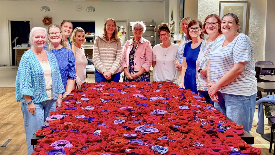 The knitters and crocheters who have been working on a community project to create 2,000 poppies for Remembrance displays. (34959909)