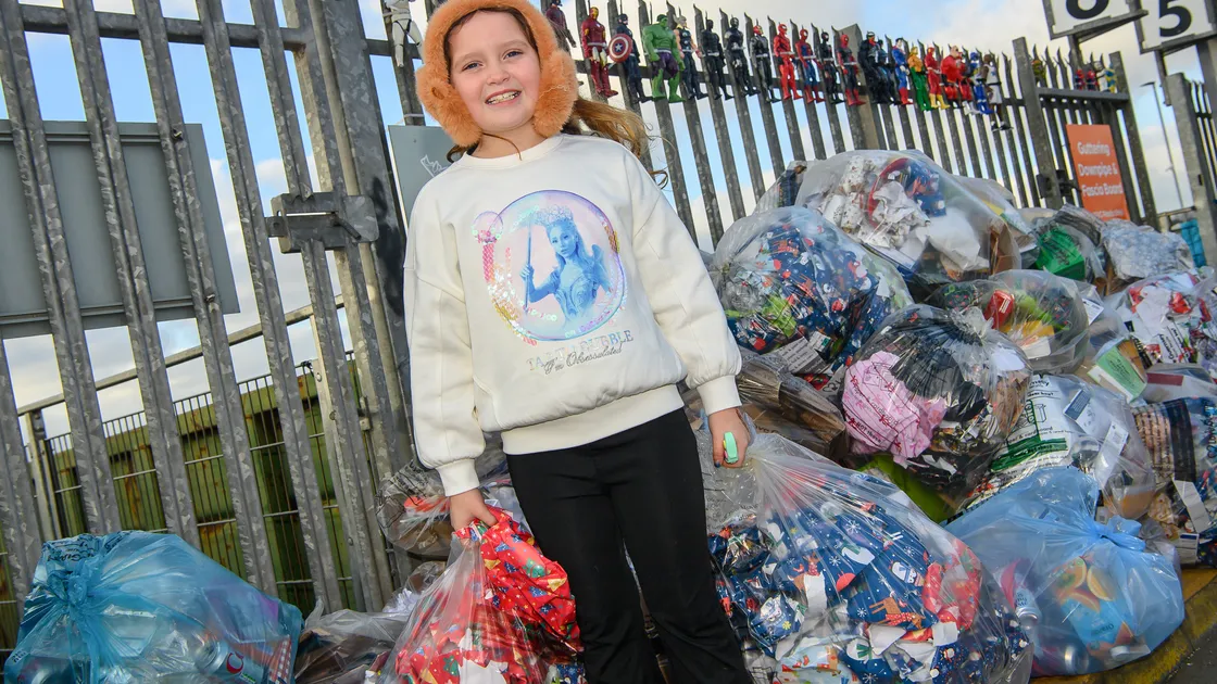 Zerin May, 7, at the Household Recycling Centre at Longue Hougue on Saturday as it reopened after the festivities.  (Picture by Andrew Le Poidevin, 34553190)