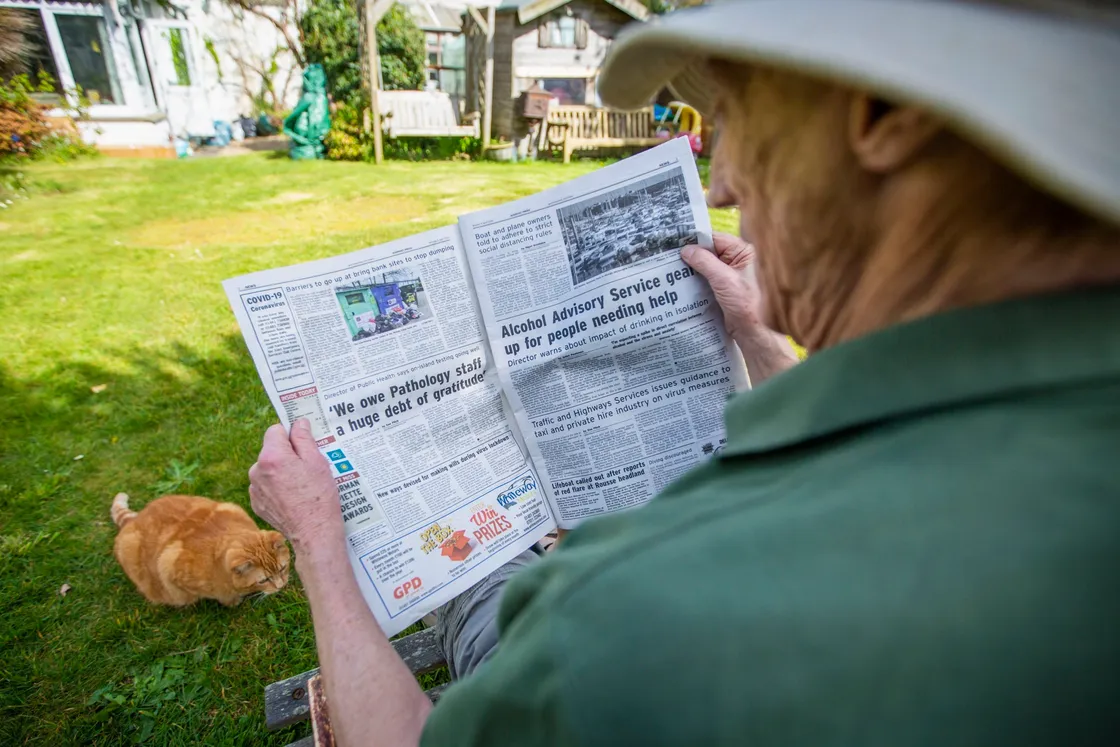 Picture by Sophie Rabey. Over 65 reading Guernsey Press at home. (27899392)