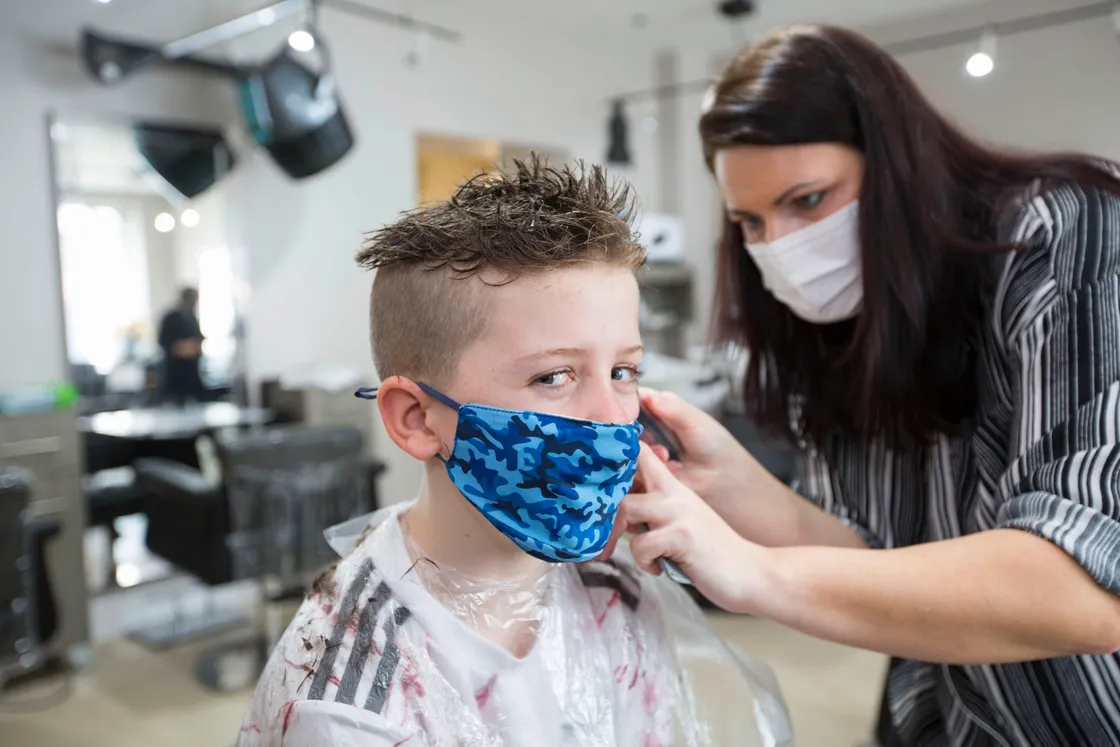 A slightly apprehensive look from Jacob Morgan as Elaine returns him to his spiky hairstyle of three years ago. (29331636)