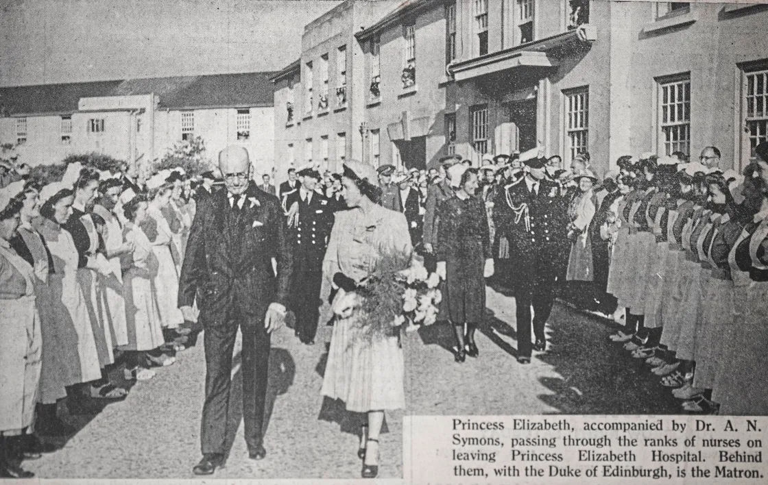 This Guernsey Press picture shows Princess Elizabeth walking through the ranks of staff after the opening ceremony.