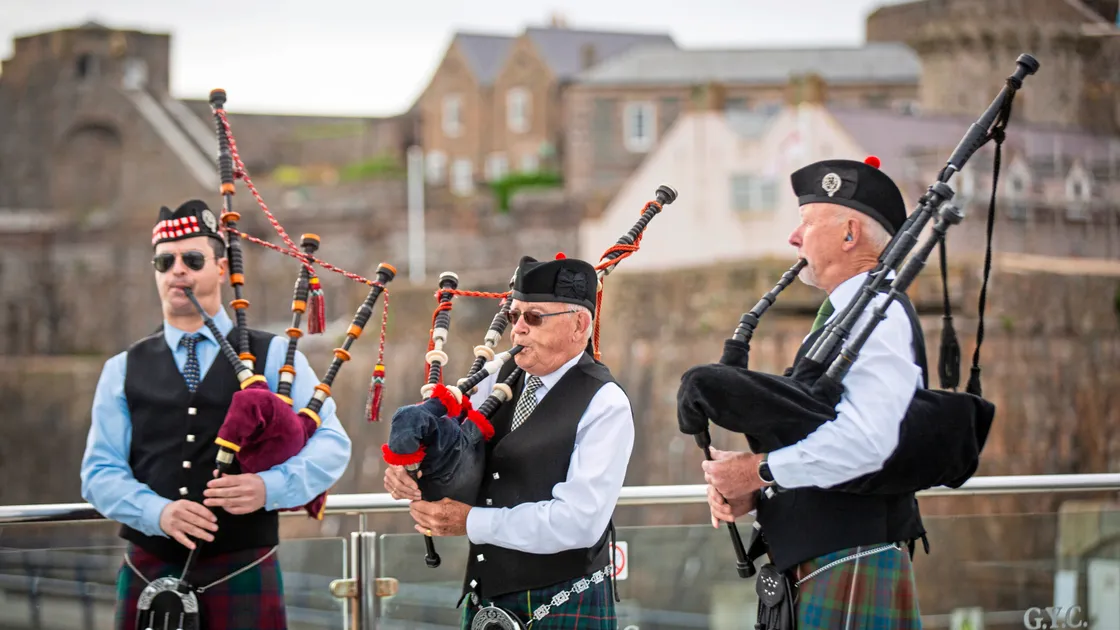 The pipers playing in commemoration of the 80th anniversary of D-Day. (Picture by Sophie Rabey, 33269829)