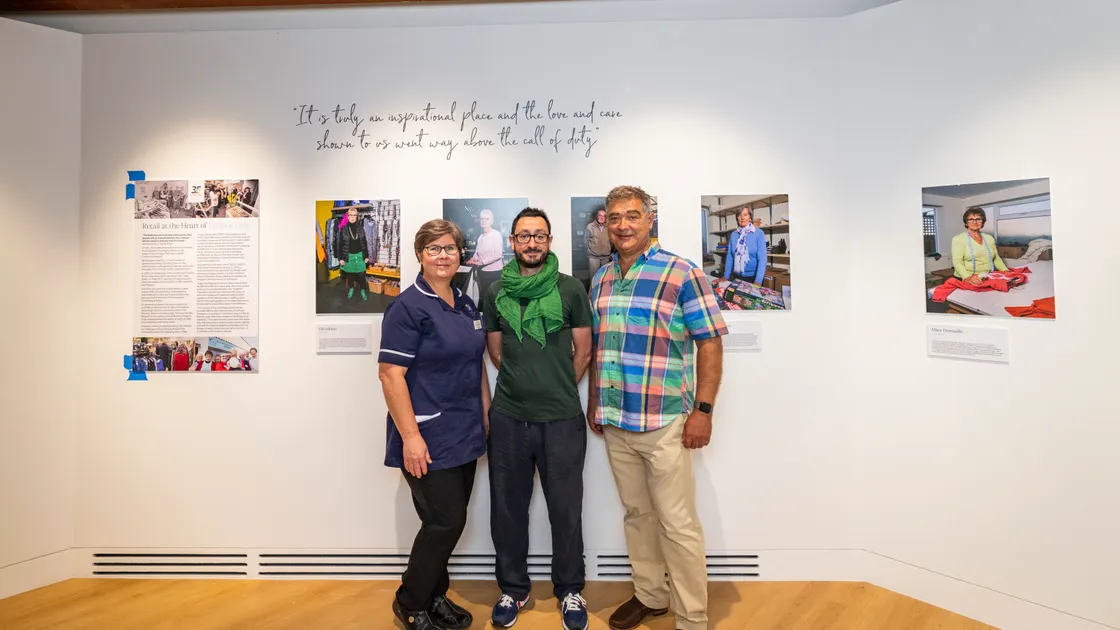 Photographer Aaron Yeandle, middle, pictured with Les Bourgs care manager Letishia Vermeulen and CEO Rob Jones.