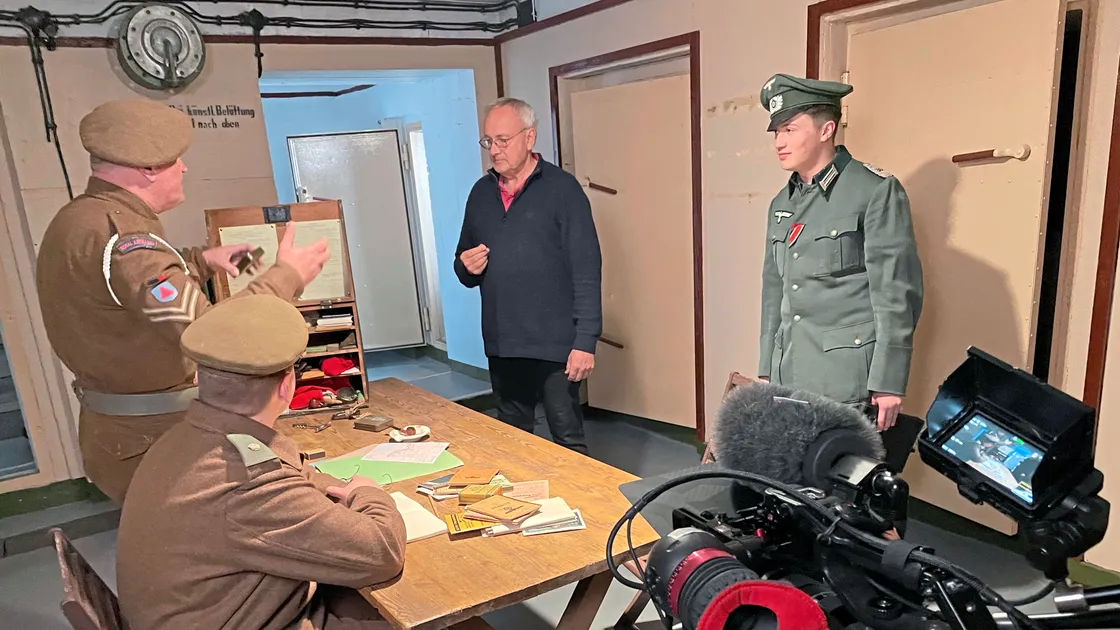 Ghosts of Alderney documentary co-producer Robert Hall with some of those who appear in short re-enactments during the film