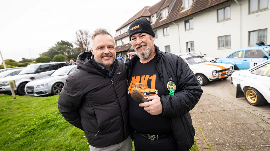 Andy Priaulx, who officially started the rally by waving the cars through the start line, with event commentator Lee Corbet.