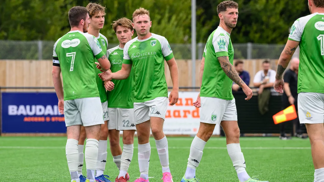 Guernsey FC celebrate their second goal, scored by No 7 Charlton Gauvain, against Sheffield FC on Saturday at Victoria Park.