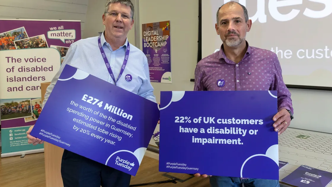 Participants in Guernsey Disability Alliance’s Purple Tuesday, Paul Watts from Savills, left, who is an access auditor for the Guernsey Disability Alliance, with Mike Read, chairman of Cystic Fibrosis Guernsey. (30154185)
