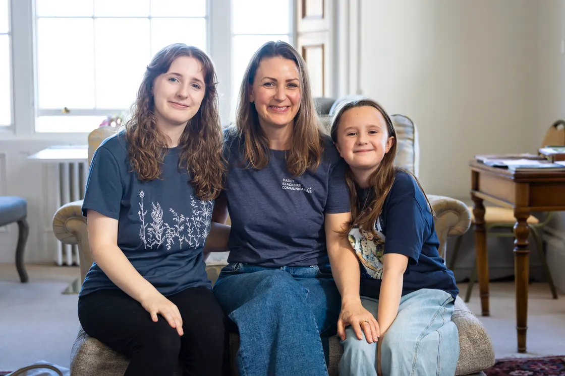 With daughters Evie, 16, and Ada, 9, who often speak with her at events.