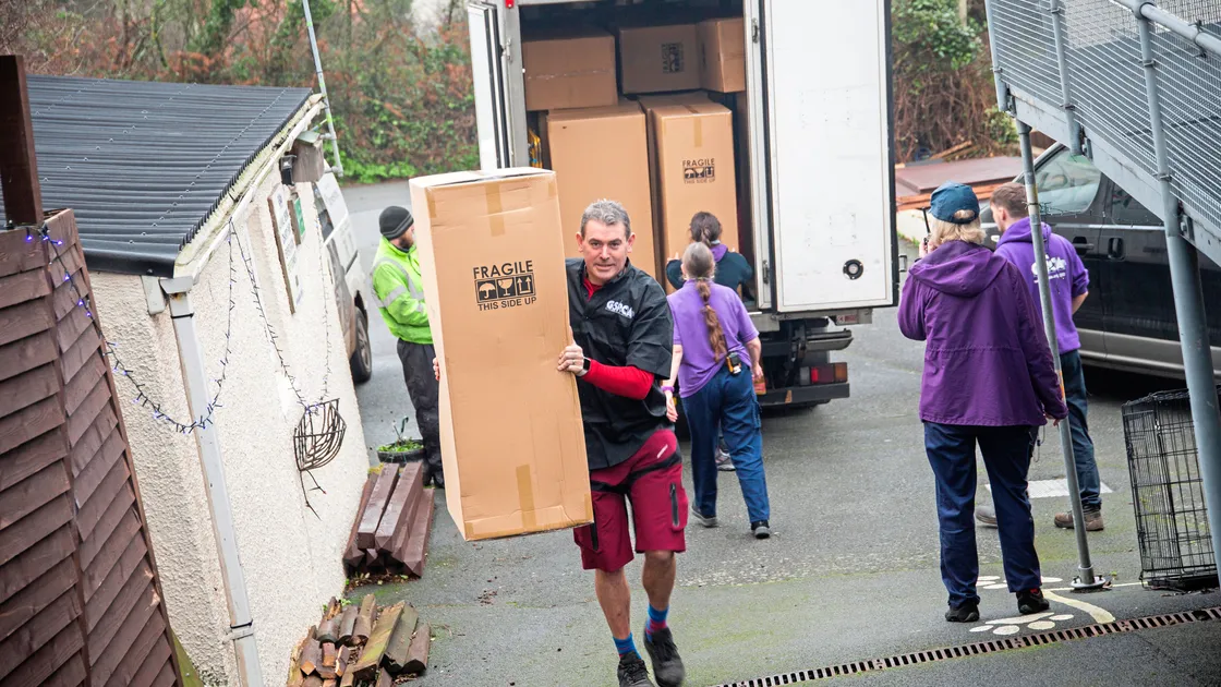 GSPCA manager Steve Byrne carrying one of the 60 Dolphin statues for this year’s charity trail. (Picture by Sophie Rabey, 33903479)