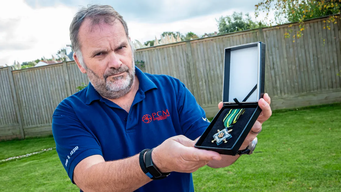 Ben Remfrey MBE has been awarded a Ukrainian ‘Support Cross’ by Commander of Support Forces, Major-General Dmytro Gerega, for his work in Ukraine disposing of unexploded ordnance. (Picture by Peter Frankland, 33646168)