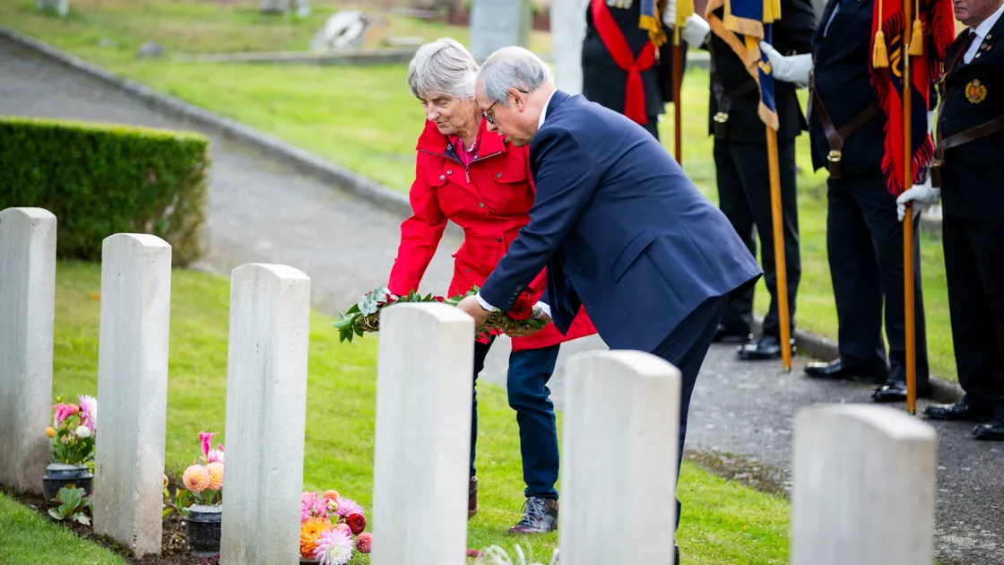  Patricia Lufkin and Philip Burrows laying a wreath at Le Foulon cemetery. (Picture by Luke Le Prevost, 31302456)