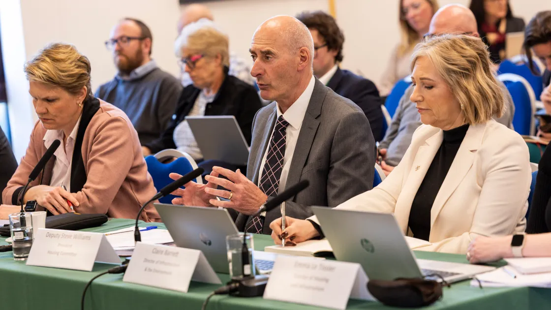 Housing president Steve Williams is flanked by vice-president Sasha Kazantseva-Miller and senior official Claire Barrett (right) at the Scrutiny Hearing held at the Castel Douzaine Room.