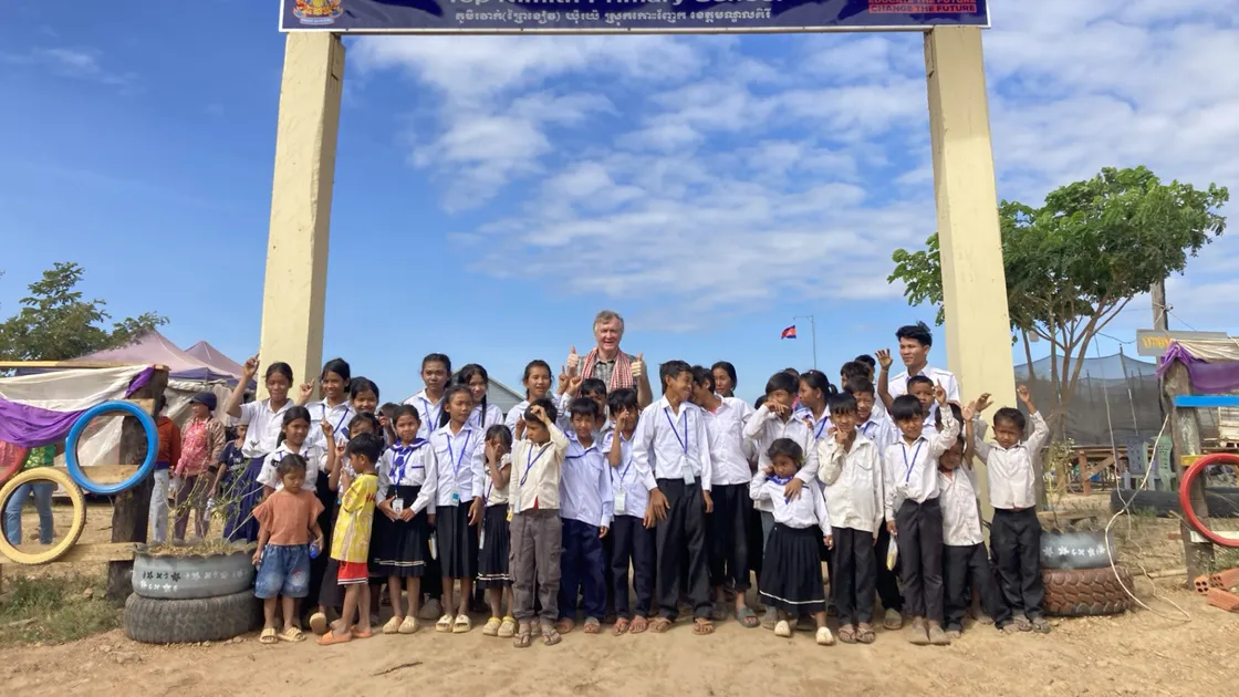Dr Paluch with some of the pupils at the brand-new Guernsey Aid funded school at Tep Nimith in northeastern Cambodia.
