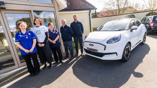 Les Bourgs Hospice raffling electric car