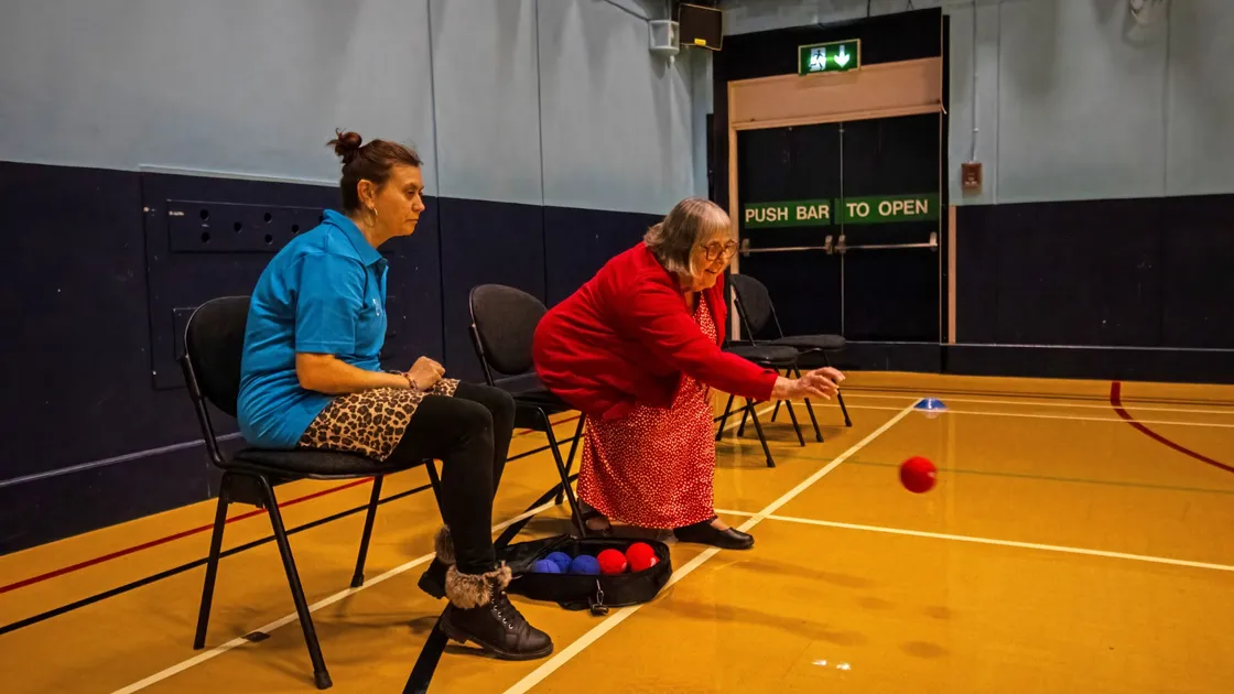 Becky, left, and Barbara Duquemin playing a game of boccia. (Picture by Kai Correia)