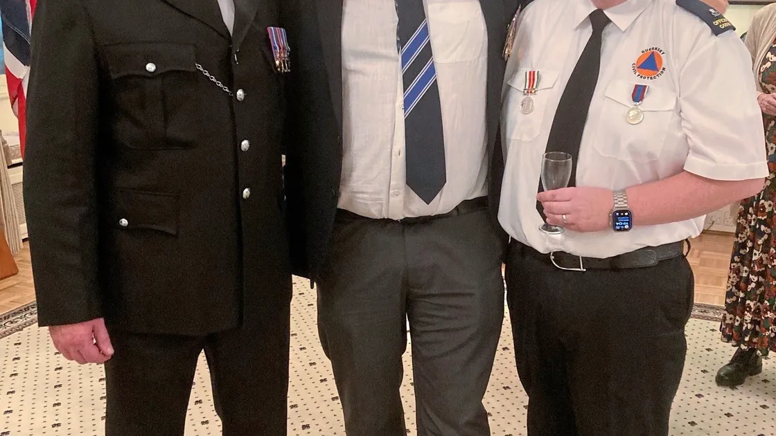 Retired Detective Inspector David Ecuyer, left, Sergeant Ben Rowe and civil protection officer Dave Hodge, right, celebrate their awards. (34002729)