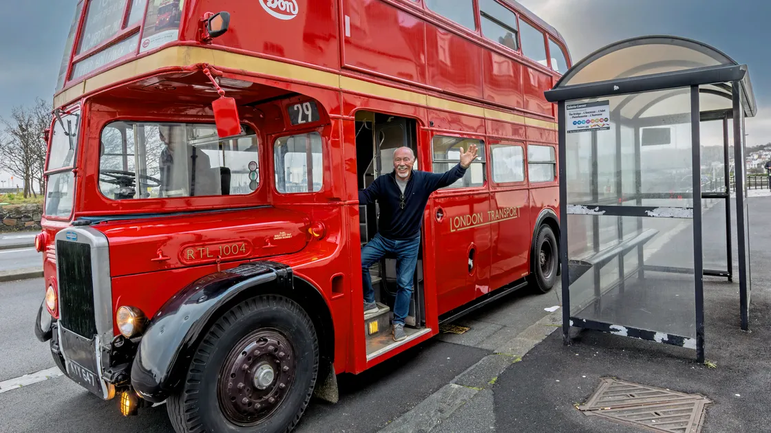 Next stop the Peninsula: Ian Walker with his London Bus bought at Goodwood after noticing an old route sign on the bus which read ‘Town via Airport, Forest Road, Grange'. (Picture by Chris George)