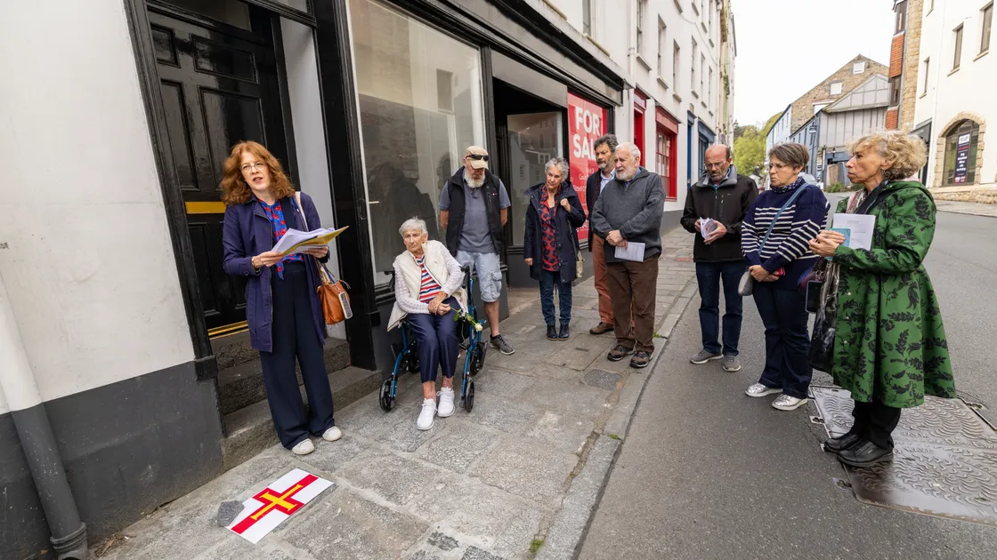 Members of Ernest Legg’s family in the Bordage yesterday at an unveiling of a Stolpersteine stone dedicated to the former Guernsey Underground News Service member. The stone is one of 12 to be installed across the island, remembering those who experienced Nazi persecution through the Occupation.