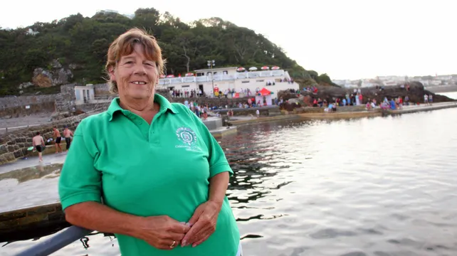 Many tributes are paid to beloved swimming coach Jo