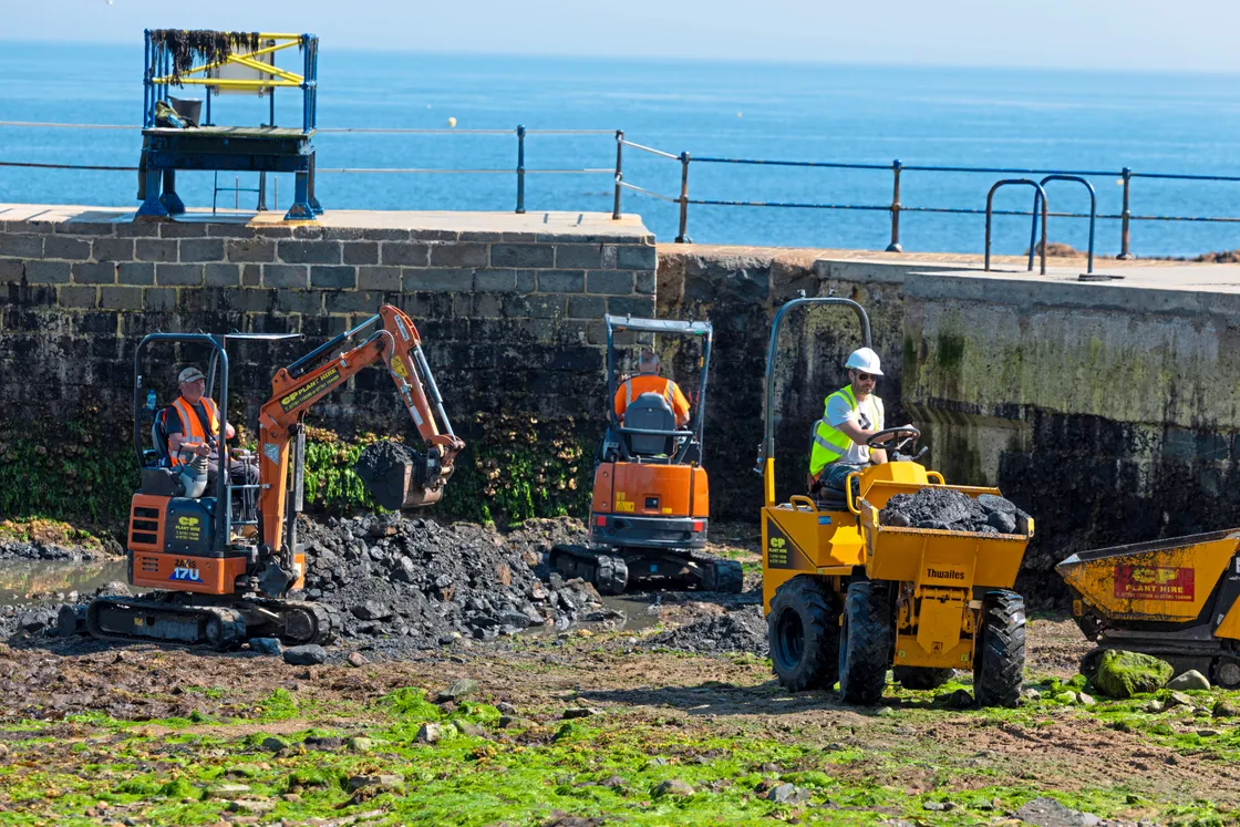 Building company F. Watson and Son had two diggers and two dumper trucks craned in to the Ladies’ Pool.
