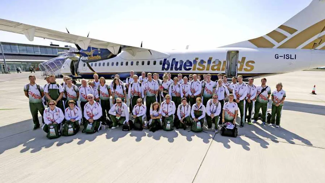 Proud families at airport to welcome returning athletes