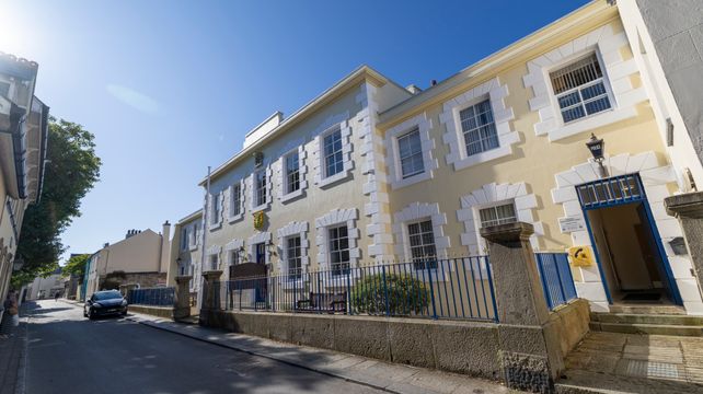 Political change in Alderney is described as being premature