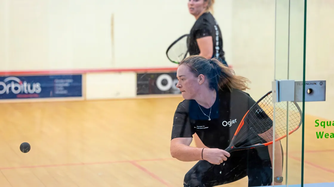 Women’s A winner Sophie Young playing against Abby Darnell