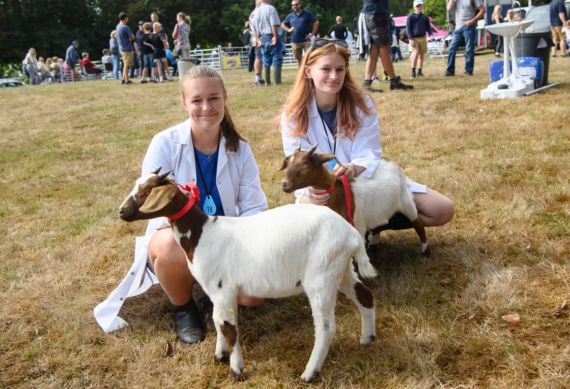 Charlotte and Charis Burgoine with their goats. 