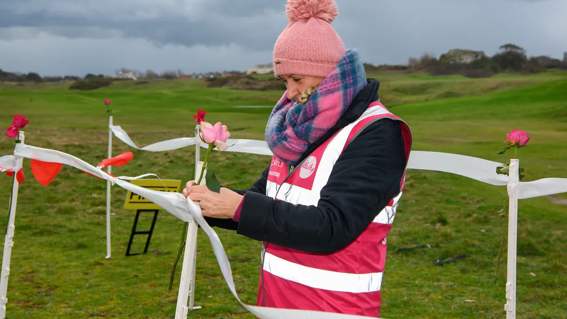 Volunteer Jo Farrell added some romance to the finish line of this weekend’s Parkrun by adding roses to the posts at the finishing line