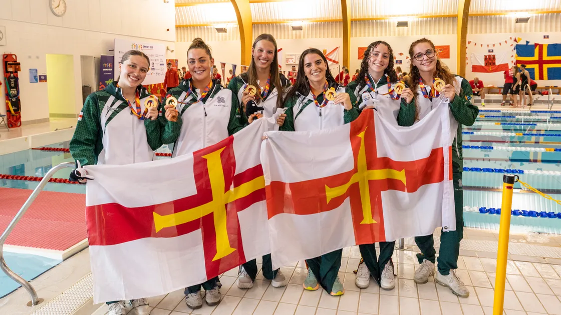 Guernsey top the swimming medals table after day one in the pool.