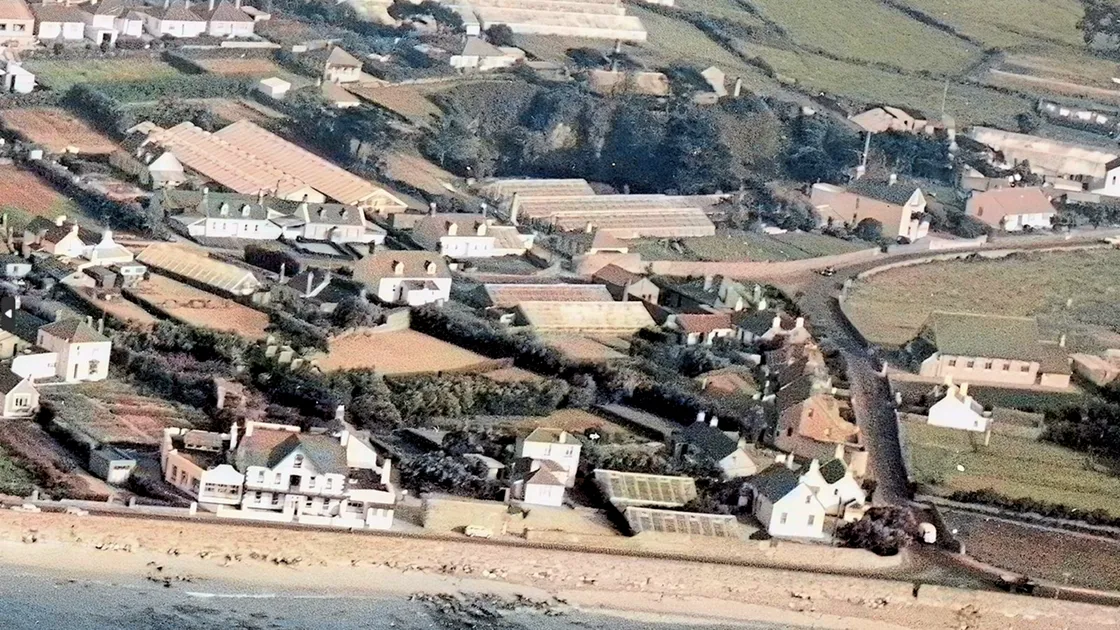 Cobo Mission Hall sits almost alone on the southern flank of Route de Cobo while the Rockmount – then a Bert Curr-run hotel – dominates the beach front