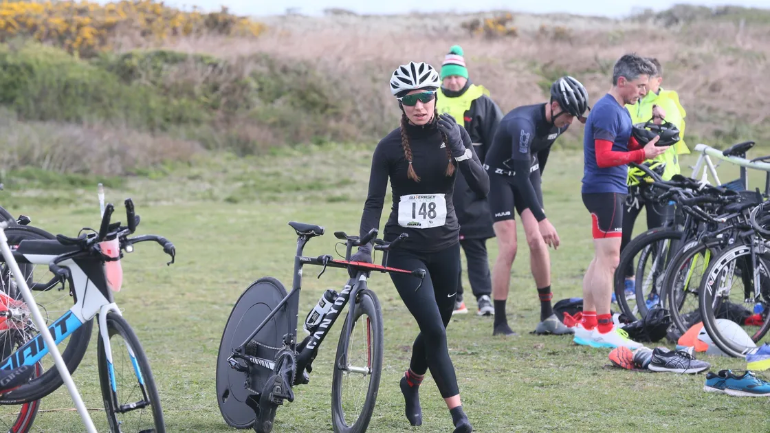 Women’s race winner Megan Chapple heading out on her bike leg. (Picture by Adrian Miller, 29423578)