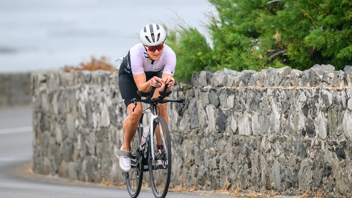 Amy Critchlow en route to winning Sunday's Rocquaine Sprint Triathlon and earning an automatic Island Games place..