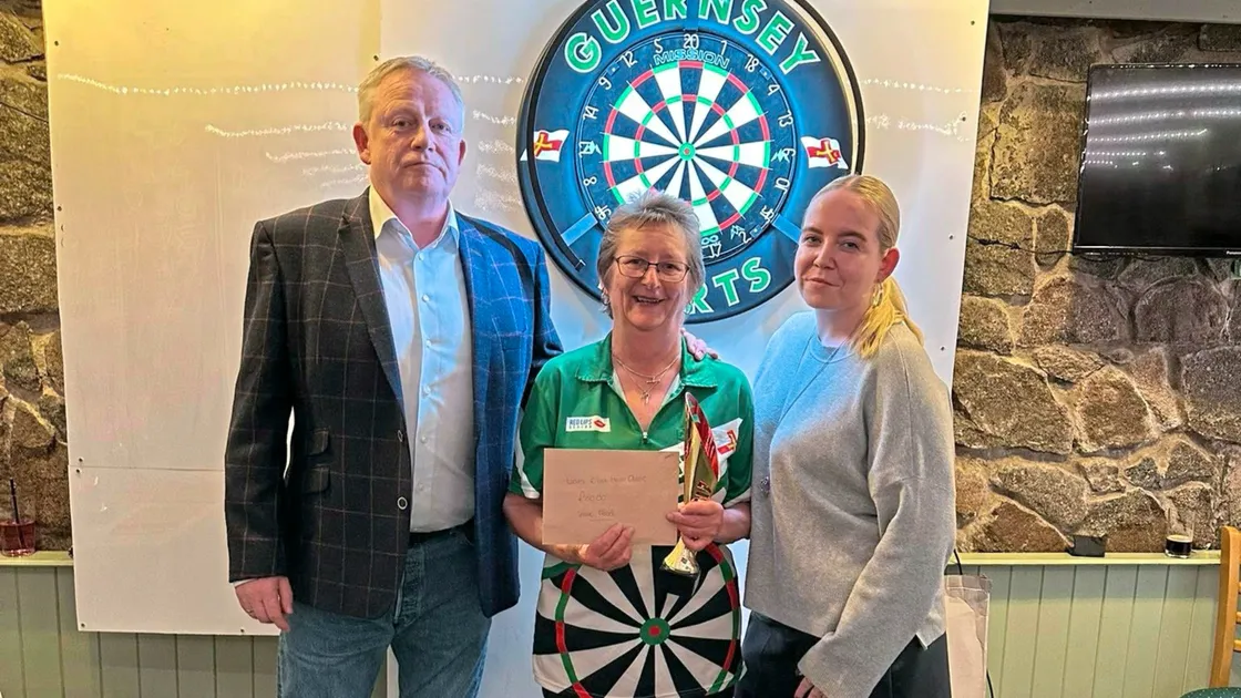 Guernsey’s Kate Flood, shown here between Herm head of hospitality Tom Jones and his daughter Morgan