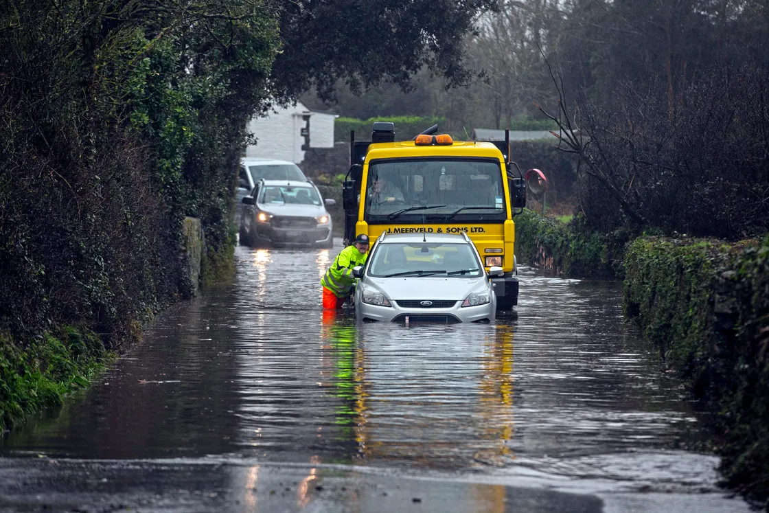 Connor Harvey of J Meerveld and Sons, pictured, used his truck to push a car out of floodwater at La Ramee. (Picture by Peter Frankland, 33992581)