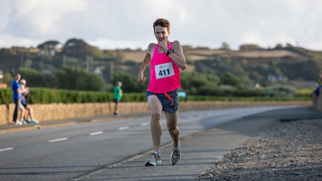 Race winner Jack Rees powers towards the finish line at the northern end of Vazon.