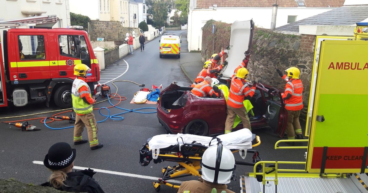 Car roof cut off to rescue driver
